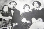 Помещики села Дубки Шлыковы Василий и Аделаида с дочерьми Раисой и Виргинией, 1858